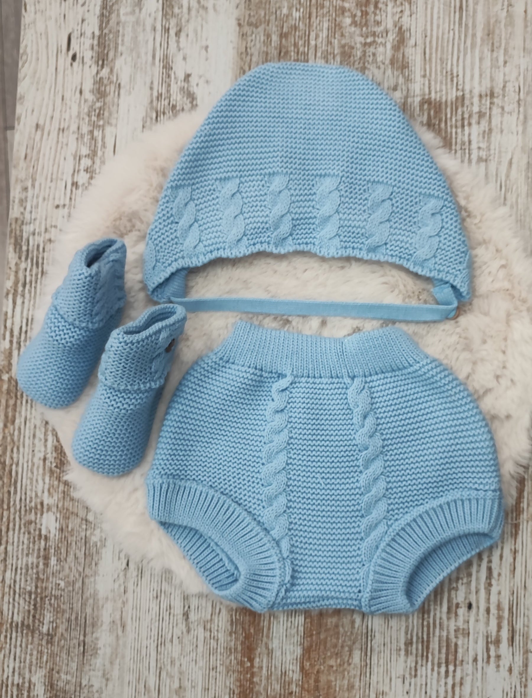 Conjunto pololo, capota y botitas.