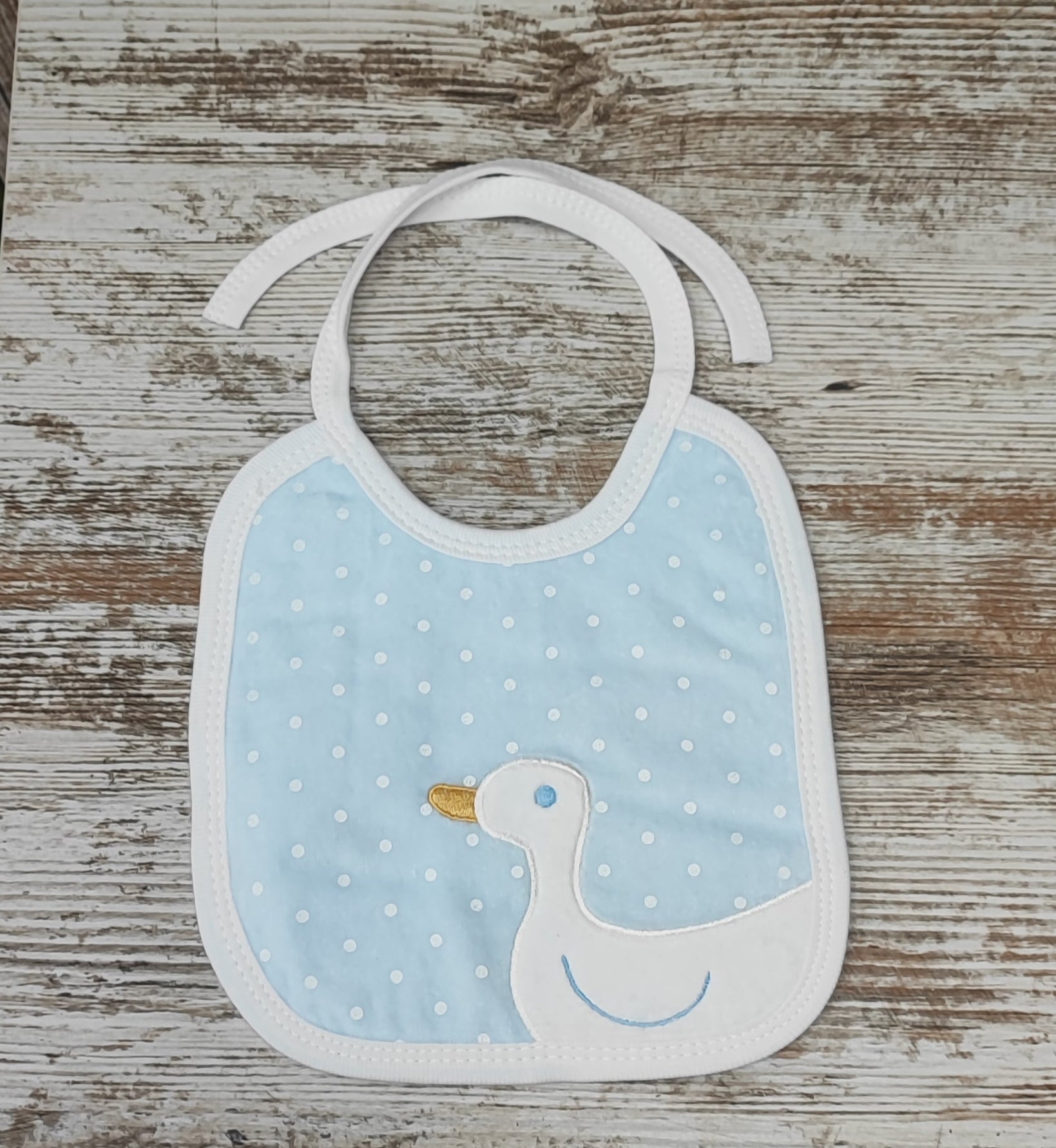 Capa de baño + babero patito.