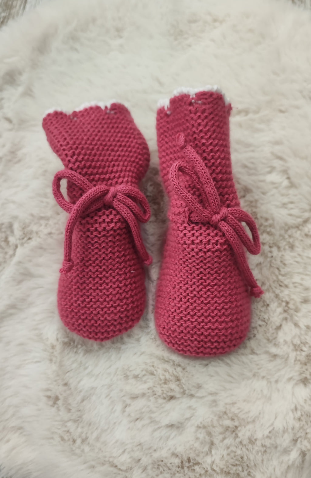 Conjunto pololo capota y botitas.