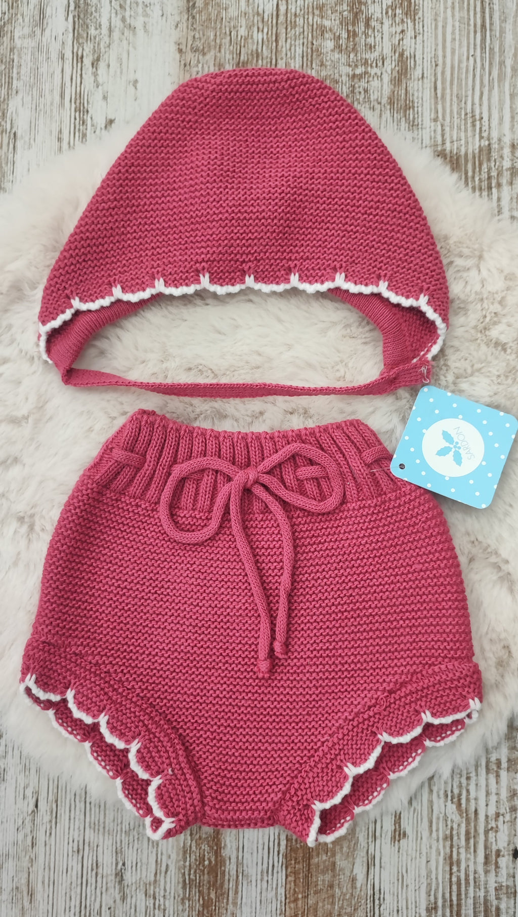 Conjunto pololo capota y botitas.