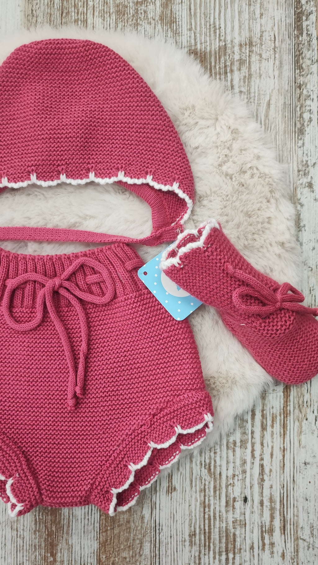 Conjunto pololo capota y botitas.