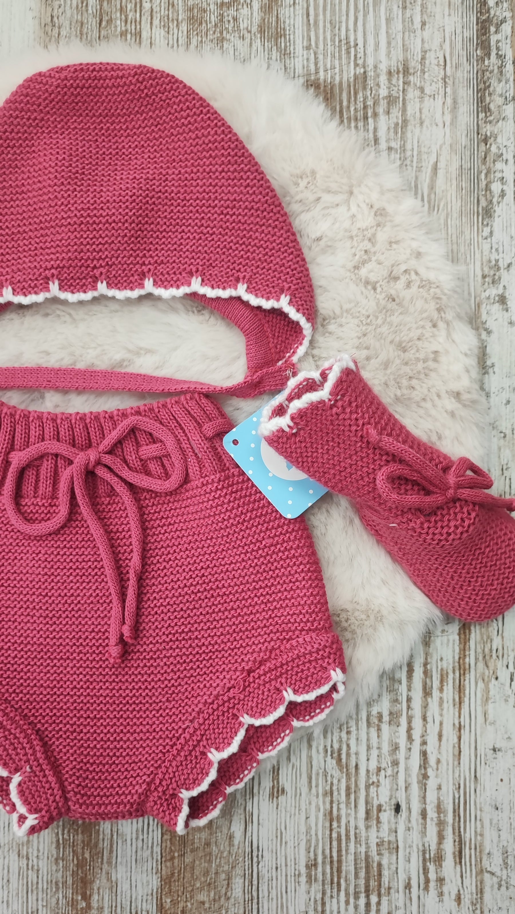 Conjunto pololo capota y botitas.