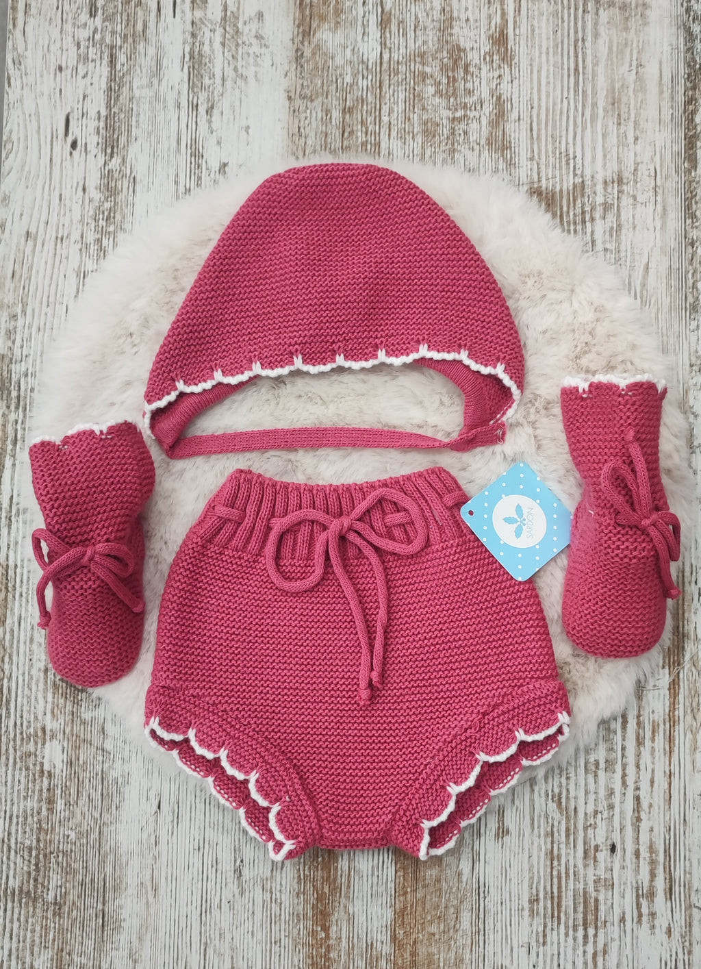 Conjunto pololo capota y botitas.